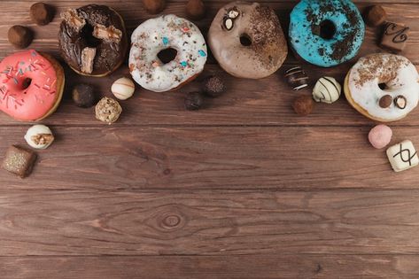 Free photo colorful donuts with chocolat... | Free Photo #Freepik #freephoto #sweet-dessert #chocolate-top-view #dessert #sweet-food Food Wallpaper For Laptop, Wallpaper Donat, Dessert Landscaping, Donut Background, Bakery Website, Colorful Donuts, Dessert Chocolate, Food Wallpaper, Sweet Food