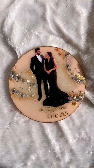 SHIKHA | RESIN ARTIST ☃️ on Instagram: "Perfect wedding gift for your favourite person💖 Get such pretty frames customised from me! 🫶🏼 Every detail in the artwork is designed specially for you 🥰 Dm to order 🌻 Customisation available !!🥰 . . . . . . . . . . . . . . . . . . . . . . . . . . . . . . . . . . . . . . #art #resinart #mantra #navkarmantra #jain #resin #resincraft #resinmolds #resincrafts #resinartwork #fluidart #painting #artist #artistsoninstagram #artistsofinstagram #artistonig # Wedding Resin Frame, Diy Resin Wedding Gifts, Resin Art Photo Frame For Couple, Wedding Resin Art, Photo Resin Art, Resin Frame Ideas, Resin Photo Frame Ideas, Resin Wedding Gifts, Resin Art Photo Frame