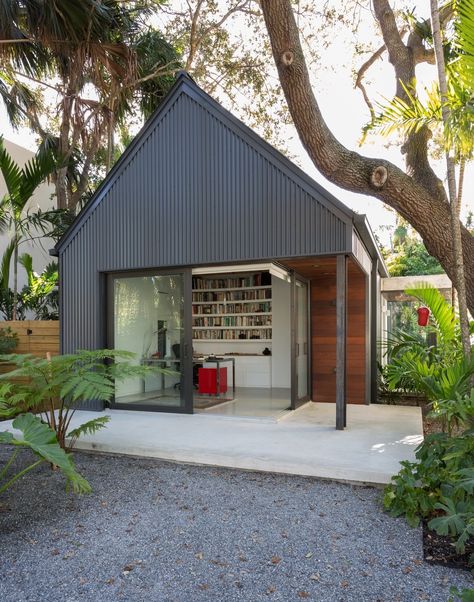 Dwell - A Minimalist Bungalow in Miami Welcomes a Sleek New Addition Minimalist Bungalow, Corrugated Metal Siding, Vertical Siding, Standing Seam Metal Roof, Bungalow Homes, Studios Architecture, Metal Siding, Standing Seam, Shed Homes