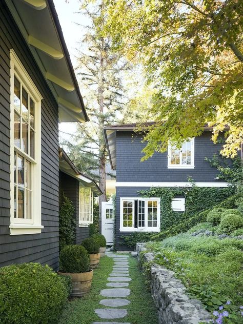 Architect Gil Schafer Turned a California YWCA Camp Into a Storied Family Home Casa Casuarina, Gil Schafer, Dark House, Cottage Exterior, Stone Walkway, Backyard Landscaping Designs, Walkway, Exterior Colors, Exterior Paint