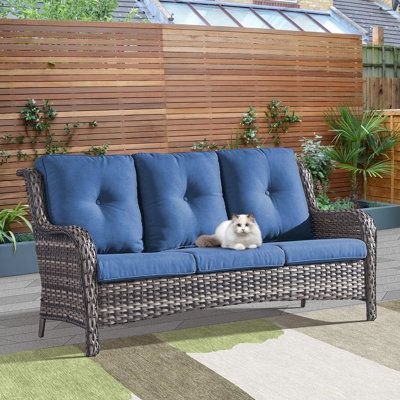 Add great comfort and style to your indoor and outdoor space, this Wicker Patio 3-Seats Sofa features a sturdy powder-coated steel frame and high-quality hand-woven resin wicker. Cozy cushions and a high curved armrest just give the right amount of support for the head and neck, this sofa is an ideal choice for your year's last use. Cushion Color: Blue, Frame Color: Gray | Red Barrel Studio® Carolina 75" Wide Outdoor Wicker Patio Sofa w / Cushions Wicker / Rattan in Gray | 35 H x 75 W x 35 D in Navy Blue Cushions, Outdoor Glider, Wicker Sofa Outdoor, Wicker Loveseat, Patio Glider, Patio Couch, Patio Loveseat, Swing Design, Outdoor Loveseat