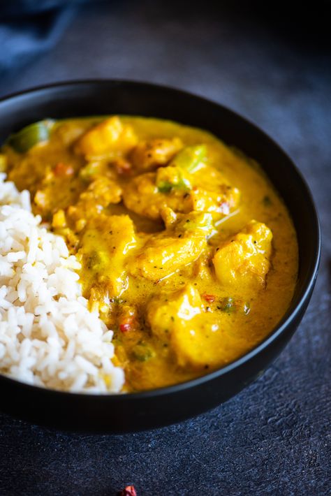 This Yellow Fish Curry recipe is loaded with super moist chunks of cod and green and red bell peppers drenched in a creamy, silky yellow curry. This restaurant-worthy family meal brings home the spice, is perfect for the entire family, and can be prepared in less than 30 minutes. Curry Fish Recipes, Yellow Curry Recipe, Curry Fish, Lemongrass Paste, Yellow Curry Paste, Honey Mustard Glaze, Fish Curry Recipe, Yellow Curry, Mom Recipes