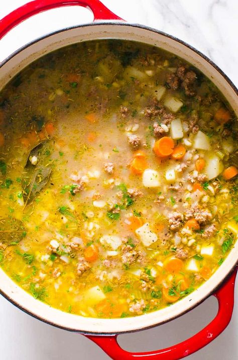 This Beef Barley Soup is flavorful, incredibly easy and satisfying on a cold day. Healthy one pot meal ready in an hour with ground beef, hulled barley and vegetables. So good! Turkey Barley Soup, Vegetable Beef Barley Soup, Turkey Soup From Carcass, Barley Soup Recipe, Vegetable Barley Soup, Healthy One Pot Meals, Beef Barley, Beef Barley Soup, Healthy Soups