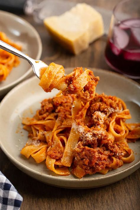 My Favorite Bolognese | Packed w/ flavors but not too heavy. Most of the cooking is being done in the oven! #bolognese #beef #parmesan #tomato #whitewine #italianrecipe #pasta #tagliatelle #dinner #dinnerrecipe #comfortfood #carrot #celery | The Missing Lokness Chocolate And Orange Tart, Pudding From Scratch, Banana Pudding From Scratch, Magnolia Bakery Banana Pudding, Canning Crushed Tomatoes, Parmesan Rind, Magnolia Bakery, Pasta Bolognese, Hearty Comfort Food