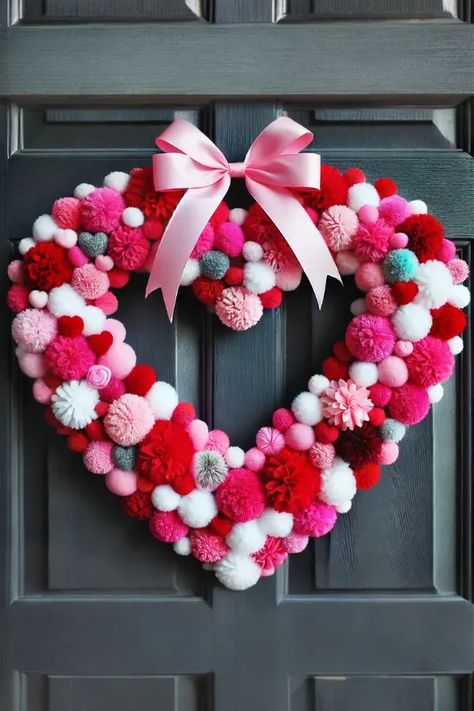 DIY Dollar Store Valentine’s Wreath Ideas Pom Pom Valentine Wreath, Valentines Door Wreath Diy, Valentine's Day Wreaths Diy, Pom Pom Heart Wreath, Valentine Door Wreath Diy, Valentines Day Wreath Diy Dollar Tree, Diy Valentines Decorations Dollar Stores, Dollar Tree Heart Wreath Diy, Valentine’s Day Wreath Ideas