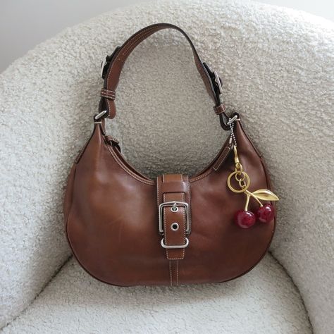 🐻 Y2k 2003 Brown Leather Coach Hamptons Hobo Bag🐻 ⋆ Free US shipping ⋆ 12" x 8" ⋆ good condition ⋆ great condition, stains on back shown ⋆ $145 shipped ⋆ Comment "sold" or dm me to purchase ⋆ Charms included #y2k #2000s #vintagebag #thrift #vintagecoach #vintage #fallinspo #pinterest #fallaesthetic It Girl Bag, Coach Vintage Bag, 2000s Bags, Fall Pinterest, Coach Hobo Bag, Vintage Designer Bags, Coach Hobo, Vintage Coach Bags, Brown Leather Bag