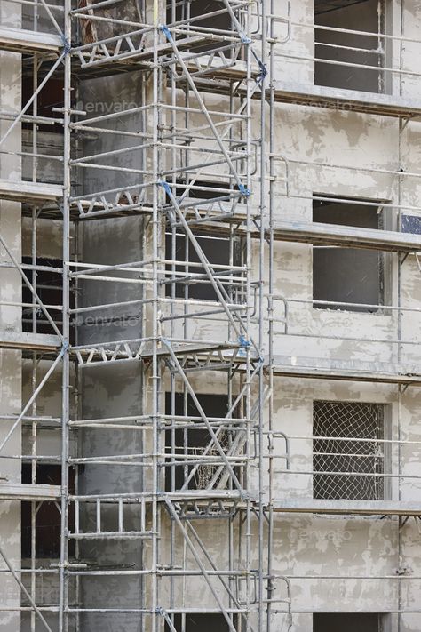 Scaffolding structure on a building. Construction architecture industry. Workplace by ABBPhoto. Scaffolding structure on a building. Construction architecture industry. Workplace#building, #Construction, #Scaffolding, #structure Building Site Construction, Building Scaffolding, Scaffolding Architecture, Construction Scaffolding, Gifts For Construction Workers, Industrial Building Design, Scaffolding Design, Architecture Exam, Building Under Construction