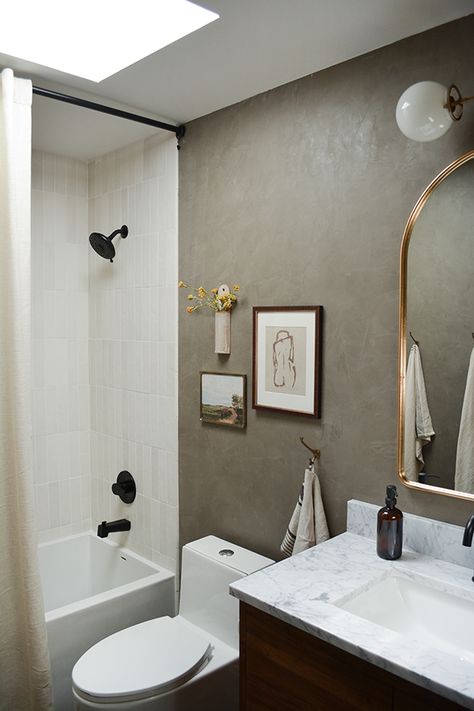 Guest Bathroom Flooring Ideas, Guest Bathroom Ideas Moody, Black Floors In Bathroom, Earthy Guest Bathroom, Roman Clay Bedroom, Black Tile Floor Bathroom, Roman Clay Bathroom, Lime Wash Bathroom, Bathroom With Skylight