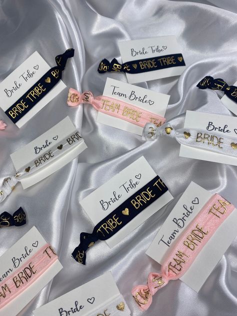 Team Bride Ideas Bachelorette Parties, Bride Team Ideas, Team Bride Ideas, Bridesmaid Goodie Bags, Bride Party Ideas, Gold Hair Band, Bride Team, Bride Bracelet, Black Bridesmaid