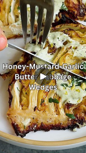 419K views · 3K reactions | HONEY-MUSTARD-GARLIC BUTTER CABBAGE WITH TAHINI-YOGURT RANCH! Still one of the best cabbage recipes I have ever had— tender, buttery, flavorful and super satisfying to eat 💕 *NOTE: You may not need all of the butter depending on size of cabbage—recipe made for large*
•
For the butter:
7 tbsp unsalted butter, softened/slightly melted 
2 tbsp honey 
1 tbsp yellow mustard 
2 tbsp chopped scallions 
2 cloves garlic 
1 tbsp olive oil
 1 tsp salt
1/2 tsp pepper
•
For the cabbage:
1 medium head cabbage, sliced into 6 wedges
•
For the ranch:
1/4 cup tahini 
1/4 cup plain yogurt 
2 tbsp chopped scallions 
2 tbsp fresh chopped parsley 
1 tbsp lemon juice
1 tbsp ranch seasoning 
1/4 tsp salt 
1/4 tsp pepper 
2-3 tbsp water 
•
Toppings:
Chopped pistachios 
Chopped scallion Honey Mustard Garlic Butter Cabbage, Recipes With Cabbage, Butter Cabbage, Best Cabbage Recipe, Roasted Beets And Carrots, Yogurt Ranch, Buttered Cabbage, Zucchini Side Dishes, Roasted Beets