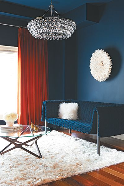 5 most popular paint colours across Canada - Chatelaine Royal Blue And Orange Living Room, Navy Blue And Burnt Orange Living Room, Navy Blue And Orange Living Room, Navy And Burnt Orange Living Room, Orange Interior Design, Blue And Orange Living Room, Burnt Orange Living Room, Orange Living Room, Orange Rooms