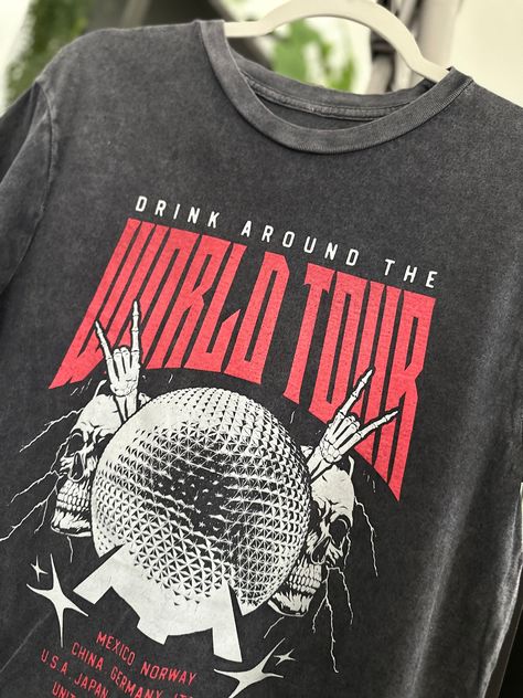 Drink Around The World - World Tour Vintage Black Tee! Featuring a vintage black rock tee design, this shirt showcases the iconic Epcot ball and highlights all the countries where you can indulge in delicious drinks. Get ready for a global adventure! World Tour Shirt Design, Tour Tshirt Design, Tour Shirt Design, Music Festival Tshirt, Epcot Ball, Svt Concert, Marathon Tee, Vintage Rock Shirt, Graphic Tees Street Style