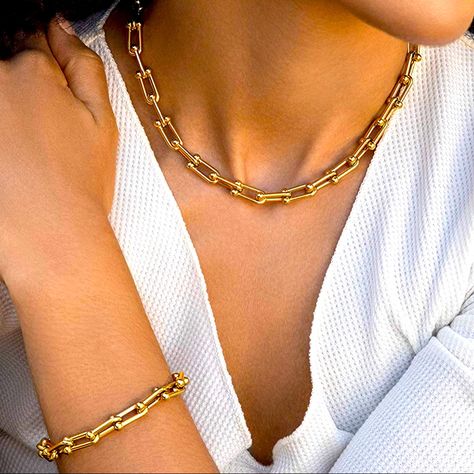 Ladies U-Link 14k Gold Plated Paperclip Necklace & Bracelet Set. This Chunky And Bold Adjustable Set Is Now The Latest Must-Have Jewelry Upgrade. Worn Alone Or Layered With Some Of Your Favorite Pieces, This Set Makes An Impactful Statement. The Gold Chain Choker Is 14” Long With A 2” Extension Chain. The Gold Chain Bracelet Is 7” With A 2” Extension Chain. Perfect For Daytime Casual Or For Evening Glam! Trending, Chic, Elegant, And Sophisticated. Tiffany Necklace Gold, Tiffany Hardwear Bracelet, Tiffany Hardwear Necklace, Tiffany Gold Necklace, Sterling Silver Crystal Ring, Tiffany Gold, Tiffany And Co Necklace, Gold Link Necklace, Paperclip Necklace