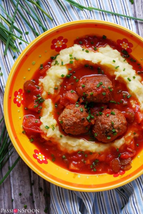 These carrot-beef meatballs are a portion of great comfort food for you to enjoy on a crisp day. The sweet, earthy and tender meatballs make a wonderful combo with a spicy vegetable sauce and mashed potatoes. A delicious simple meal. #meatballs #beefmeatballs #mashedpotatoes #easylunch #classicmeal #food #plate Meatball With Mashed Potatoes, Mashed Potato Balls With Meat, French Meatball And Potato Dish, Bbq Meatballs And Mashed Potatoes, Mash Potatoes And Meatballs, Zucchini Meatballs, Tender Meatballs, Spicy Meatballs, Chili Ingredients