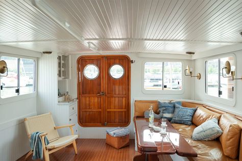 How This Family Created a Floating Summer Home Out of an ’80s Tugboat Dream Boat, Brooklyn Bridge Park, Boat Interior, Floating House, Tug Boats, Upper Cabinets, Farmhouse Sink, Kitchen Stools, Cozy Nook