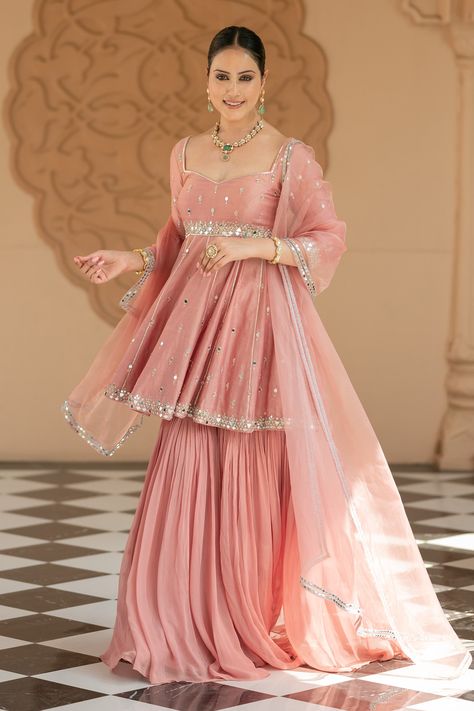 Shop for these amazing collections of Pink Semi Crepe Embroidered Mirror Sweetheart Peplum Kurta Sharara Set For Women by Esha Koul online at Aza Fashions. Sharara Hand Design, Peplum Suit With Sharara, Kurta Sets For Women Wedding, Anarkali Sharara Suits, Sharara Sleeves Design, Sharara Set For Women, Sharara Kurta Designs, Kurta Lehenga Designs, Sharara From Saree