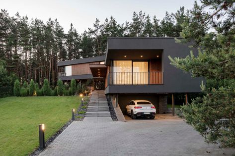 Hill house - ARCHLAB House Plans On A Hill, Modern House On A Slope, Hill Side House, Garage Below House On Hill, House With Garage Underneath, Hill House Architecture, House On The Hill Architecture, Modern House On Slope Architecture, House Built Into Hill