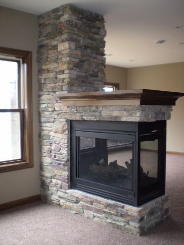 3 Sided stone fireplace with wood mantle in this LDK Lower level 3 Sided Fireplace, Wood Mantle Fireplace, Fireplace Vent, Basement Fireplace, Cabin Fireplace, Romance Aesthetic, Fireplace Update, Brick Fireplace Makeover, Bedroom Fireplace