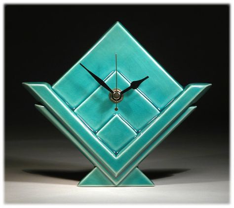 Handmade ceramic wall clock in an Art Deco style. Designed and made by Malcolm and Russell Clay Clock Ideas, Art Deco Clock Wall, Ceramic Wall Clock, Pottery Clocks Handmade, Ceramic Clocks Pottery Handmade, Clay Clocks Ceramics Handmade, Clock Ceramic Handmade, Turquoise Desk, Ceramic Clock