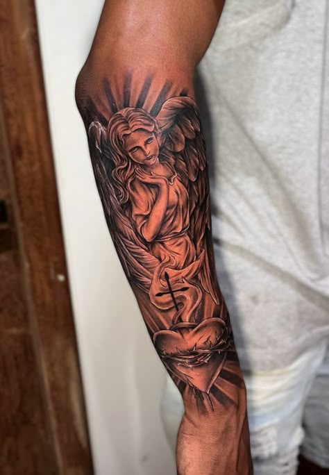 Archangel Michael Tattoo For Men Forearm, Arm Tattoo Black Man, Angel Forearm Tattoo Men, Jesus Piece Tattoo, Angel Arm Tattoo, Hand Sleeve Tattoo, Back Forearm Tattoo Men, Angle Tattoo For Men, Angelic Tattoos