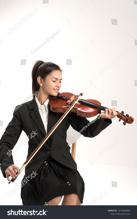 In violin practice class,beautiful asia woman hold wooden violin.learn and practice playing violin together to prepare for the concert.Education concept. #Ad , #Affiliate, #asia#woman#hold#beautiful Person Holding Violin, Holding Violin Pose Drawing, Person Playing Violin Reference, Person Playing Violin, Violin Pose, Violin Practice, Playing Violin, Base Ideas, Violin Bow