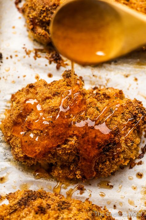 Hot honey chicken is the best chicken recipe around! The super crispy, oven-fried chicken is finished in sweet and spicy honey to make it unbelievably delicious. You will love it! #theendlessmeal #hothoneychicken #chicken #hothoney #popeyeshothoneychicken #nashvillehotchicken #spicychicken #sweetchicken #ovenfriedchicken #crispychicken #dinner #chickenrecipe #familymeal #refinedsugarfree Baked Hot Honey Chicken, Honey Chicken Breast, Best Chicken Recipe, Crispy Honey Chicken, Honey Fried Chicken, Hot Honey Recipe, Cornflake Chicken, Chicken Oven, Hot Honey Chicken