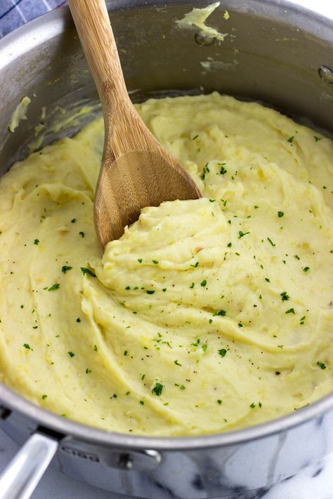 A pot full of mashed potatoes with a wooden serving spoon plunged in. Healthy Side Dishes For Chicken, Meal Ideas For A Crowd, Garlic Mashed Potatoes Recipe, Holiday Meal Ideas, Roasted Garlic Mashed Potatoes, Cravings Recipes, Homemade Mashed Potatoes, Side Dishes For Chicken, Indian Vegetarian Recipes