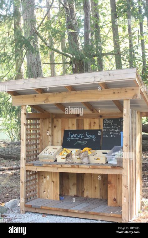 Download this stock image: A stall selling fruit by the side of the road with a trust box for the money, Ganges, Saltspring Island - 2D99YJD from Alamy's library of millions of high resolution stock photos, illustrations and vectors. Money Box For Roadside Stand, Road Side Stand Ideas, Road Side Stand, Farm Market Ideas, Kids Cubby, Yard Cart, Flower Garden Layouts, Roadside Stand, Fruit Stall