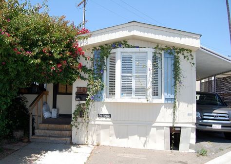 14 Great Mobile Home Exterior Makeover Ideas for Every Budget--wooden louvered shades to keep sun and heat out Mobile Home Exterior Makeover, Mobile Home Redo, Louvered Door, Mobile Home Kitchens, Mobile Home Exteriors, Mobile Home Makeovers, Mobile Home Makeover, Mobile Home Renovations, Single Wide Mobile Homes