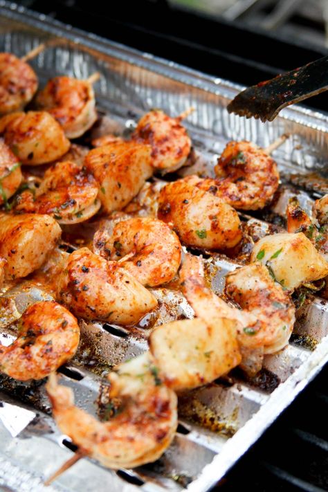 Grilled Shrimp And Scallop Kabobs - Skewered and grilled to perfection, enjoy the harmonious blend of tangy marinade and fresh seafood, making this shrimp and scallop combo suitable for any summer barbecue or family meal. Made with shrimp, sea scallops, olive oil, lime juice, garlic, salt, black pepper | CDKitchen.com Grilled Shrimp And Scallop Recipes, Bbq Scallops, Grilled Scallops Recipe, Shrimp And Scallop Recipes, Kebabs Skewers, Barbecue Shrimp, Bbq Chips, Grilled Scallops, Savory Pumpkin Recipes