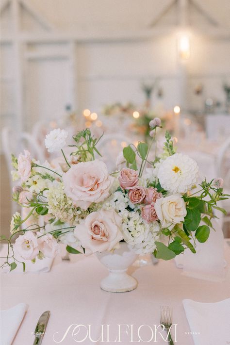 Lush garden inspired centerpieces are more than just a trend- this style is here to stay. These shades of light pink, mauve & green in a white compote are perfect for the reception at The Greenery Milton, NH. Photographer: By Hailie  Planner: Jasmine Rose Events Light Pink And White Floral Arrangements, Light Pink Wedding Centerpieces, Light Green And Pink Wedding, Light Pink Flower Arrangements, Mauve Wedding Centerpieces, Compote Floral Arrangement, Pink Monochrome, Pink Flower Arrangements, Pink Centerpieces