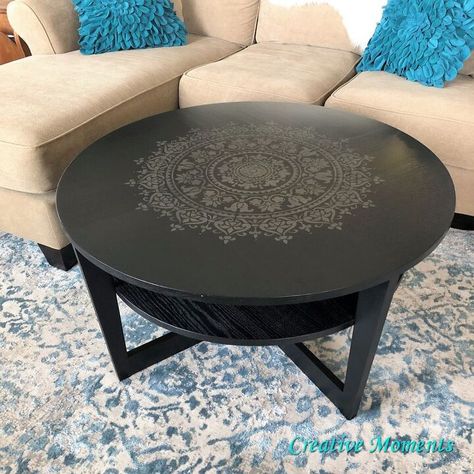 OOOOHHHMMMM... are you feeling the zen? When I saw this round coffee table I saw one of my mandala stencils right in the center for a zen like design. Take 1 round black IKEA coffee table Step one is always to clean the furniture piece well then sand the edges and add wood filler to any areas needing it Add a fresh coat of black paint Fusion Mineral Paint in coal black was brushed on in the direction of the wood grain using my Cling On short brush. Using a mister bottle… Mandala Coffee Table, Stencilled Furniture, Pottery Barn Lamps, Ikea Coffee, Furniture Remodel, Ikea Coffee Table, Lack Table, Ikea Lack Table, Market Decor