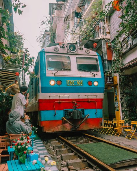 Hanoi’s Train Street 🚂 One of the things you can do in Hanoi is experience the thrill of a train passing through a narrow street, just inches away from you. You should plan your visit around the train schedule. Morning 5:20am, 6:00am, 8:30am, 11:30am Afternoon 3:30pm Evening 7:10pm, 7:30pm, 7:50pm, 8:10pm It’s always a good idea to double check the schedule for any updates. Before heading there, I read that you could only enter accompanied by someone from one of the cafes. When I arrived, ... Narrow Street, Old Train, East Asian, Vietnam Travel, The Train, Hanoi, A Train, The Things, You Can Do