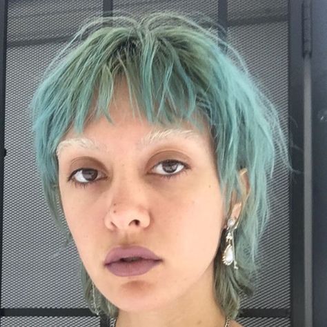 This short, teal mullet with bleached brows by @marissabaklayan is the perfect ethereal fairy-esc look. Pixie Mullet, Mullet Haircut, Split Hair, Hair Aesthetic, 짧은 머리, Trending Haircuts, Mullet Hairstyle, Cut My Hair, Hair Inspo Color