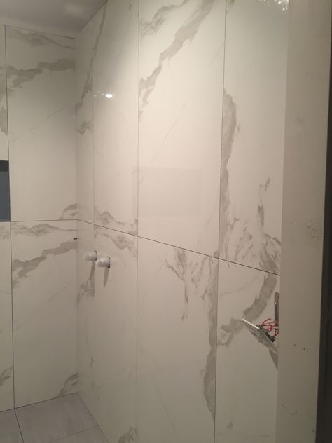 Faux Carrera Marble Tile Master Bath, Large Format Shower Tile, Grey Marble Bathroom Tiles, Countertop With Backsplash, White Marble Tile Bathroom, Florida Bathroom, Vertical Tile, Master Bath Layout, Grey Marble Bathroom