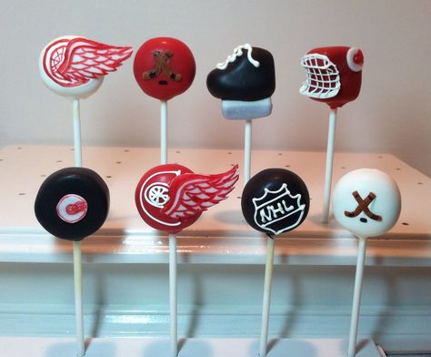 Hockey Hockey Cake Pops, Hockey Themed Cupcakes, 40th Birthday Hockey Theme, Hockey Stick Cake Ideas, Hockey Puck Cake Pops, Hockey Stick Birthday Cake, Hockey Cake, Hockey Cakes, Hockey Party