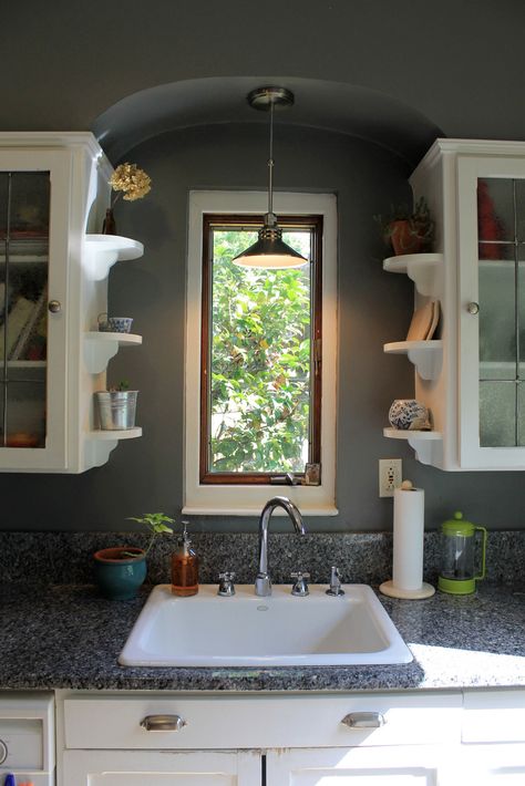 Add exterior open shelving to hold plants or dishes. This not only increases your storage, but adds architectural interest and makes your kitchen look more custom. Rounded Shelves, Kitchen Window Shelves, Music Pendant, Sink Window, Small Kitchen Decoration, Decorative Shelves, Architecture Renovation, Cabinet Shelves, Shelf Corner