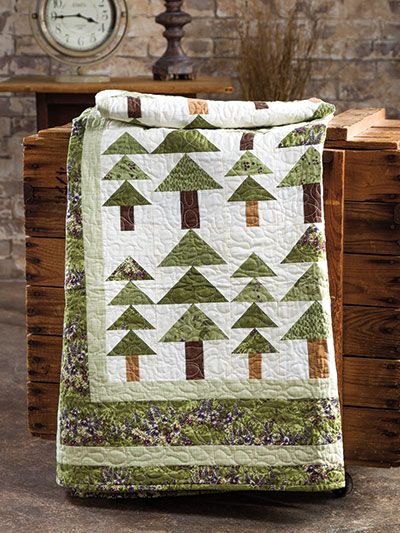 EXCLUSIVELY ANNIE'S QUILT DESIGNS: Alpine Woods Quilt Pattern Woodland Quilts, Winter Quilts Patterns, Bed Quilt Patterns, Tree Quilt Pattern, Quilt Magazine, Simple Sewing, Lap Quilts, Beginner Quilt Patterns, Tree Quilt