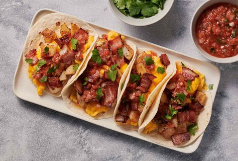 In many parts of Texas, breakfast tacos are a way of life. Once you’ve got this potato and bacon version down, you’ll be well on your way to figuring out your own favorite breakfast taco combination. Tex Mex Breakfast, Texas Breakfast, Breakfast Tacos Recipe, Breakfast Skillet Recipes, Breakfast Taco, Potato Bacon, Smoothie Ideas, Taco Ingredients, Breakfast Bites