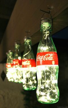 Light up your holidays with these Coke bottle luminaries. Our partner Kathy gives us easy step-by-step directions on how to make your holiday season magical. Coke Bottle Crafts, Glass Coke Bottles, Chicago Lake, Disney Recipes, Coca Cola Bottles, Cola Bottle, Glass Bottle Diy, Travel Things, Coke Cola