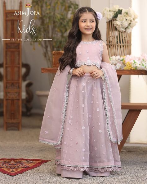 Not a fan of bright colors? Go for this subtle lilac monotone lehnga choli. Embroidered with polka dot details and sequins, this outfit is perfectly hassle-free! Launching April 4, 12PM #AsimJofa #IWearAsimJofa #AsimJofaKidsCollection #EidCollection #KidsPret #AJKids22 #FestiveCollection #KidsWear #FestiveWear #KidsCollection #Stitched Baby Girl Frocks Princesses, Long Frocks Indian Designer Dresses, Long Frocks Indian, 10 Years Girl Dress, Indian Designer Dresses, Wedding Outfits Indian, 1 Year Baby, Kids Party Wear Dresses