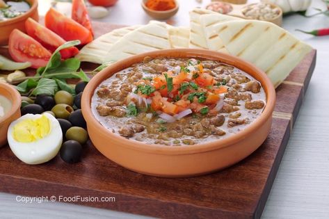 Foul Medames Arabic Breakfast Foul Medames Recipe, Arabic Breakfast, Packed Breakfast, Kinds Of Beans, Food Fusion, Fava Beans, Protein Packed Breakfast, Pepper Powder, Coriander Leaves