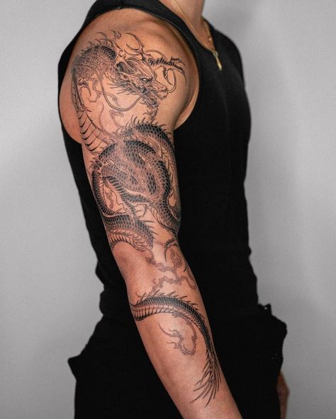 Sleeve Tattoos Men Aesthetic, Men’s Dragon Tattoo Arm, Back Tattoo Tiger For Men, Dragon Tattoo Wrapped Around Arm Men, Chinese Dragon Tattoos Shoulder, Upper Arm Tattoo Men Japanese, Arm Dragon Tattoo Men, Huge Dragon Tattoo, Koi Fish Sleeve Tattoo Men