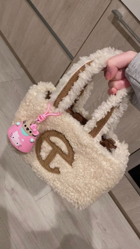 Fuzzy Telfar Bag, Cute Pink Purses, Telfar X Ugg Bag, Gift Bag Aesthetic, Sherpa Purse, Telfar X Ugg, Pusheen Keychain, Ugg Purse, Hello Kitty X Pusheen