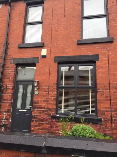 Dark Grey Window Frames, Victorian Terrace House Exterior, Victorian Exterior Color Schemes, Terraced House Exterior, Red Brick Facade, Grey Window Frames, Terrace House Exterior, Victorian Front Doors, Victorian Homes Exterior