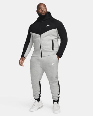 These comfy joggers bring back the signature slim fit you know for a tailored look. Our premium, smooth-on-both-sides fleece feels warmer and softer than ever, while keeping the same lightweight build you love. Tall ribbed cuffs pair with a zippered pocket on the right leg for secure storage and that signature Tech Fleece DNA. Pair them with the Tech Fleece hoodie for a uniform finish. Shown: Dark Grey Heather/Black/White Style: FB8002-064 Men Nike Tech Outfit, Tech Fleece Outfit, Nike Tech Fleece Outfit Men, Nike Tech Suit, Nike Tech Fleece Tracksuit, Nike Tracksuits, Tech Outfit, Tracksuits For Men, Nike Set