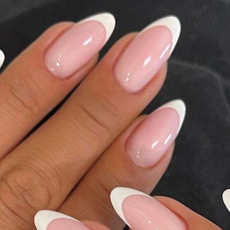 JENN’NAILS ONGLE GEL | NICE 📍 on Instagram: "Nails French 🫶🏼🌸 📲 Rendez-vous via 𝔹𝕠𝕠𝕜𝕤𝕪 #frenchnails#frenchnails💅#french#frenchnail#frenchnailstyle#frenchpink#almondnails#almondnailshape#almondnail#almondnails💅#ongles#ongle#onglerie#ongleengel#onglegel#naturalnails#nailnaturale#nails2inspire#nailsofinstagram" White Shiny French Tip Nails, French Tip Nails Pointy, 2023 Nails French, French Nails Oval Shape, French Oval Nails Design, Simple Nails Oval, Franc Nails, Almond Nail French, Bridal French Manicure