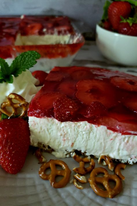 Easy Strawberry Pretzel Salad Recipe for the classic old fashioned dessert that everyone loves. This layered dessert has a buttery salty pretzel crust with a creamy middle layer that is topped with a layer of fresh sliced strawberries set in a congealed strawberry Jell-O. Enjoy with whipped cream and a fresh strawberry garnish. Jello Pretzel Salad, Strawberry Pretzel Jello Salad, Fresh Strawberry Desserts, Profile By Sanford, Strawberry Pretzel Salad Recipe, Salty Desserts, Strawberry Pretzel Salad, Recipe Strawberry, Pretzel Salad