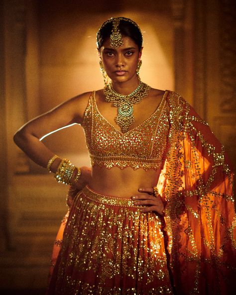 Burnt Orange Bridal Lehenga | Seema Gujral Burnt Orange Lehenga, Orange Indian Outfit, Tiered Lehenga, Three Tiered Skirt, Seema Gujral, Orange Lehenga, Banarasi Lehenga, Indian Bridal Photos, Embroidered Lehenga