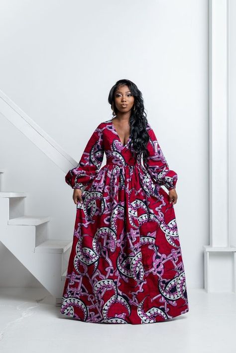 Top Trending African Maxi Dresses - Gist94 African Dress Long Sleeve, Long Sleeve Ankara Dress African Style, Ankara Long Sleeve Dress, V Neck Ankara Dress, A Line Ankara Dress, A Line Ankara Long Gown Styles, Maxi Ankara Dresses, Roora Dresses, Ankara Long Dresses